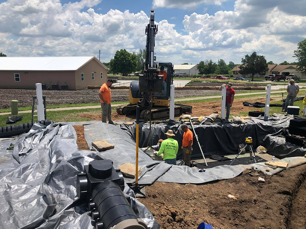 Gradex crew working on site with crane