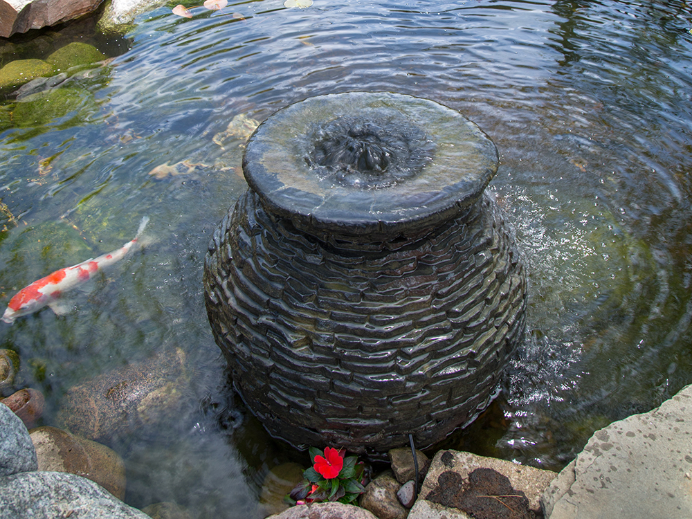 scalloped urn fountain installed by Gradex