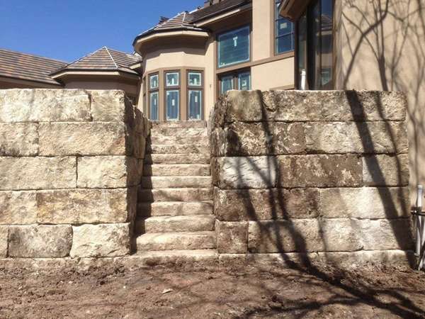 New stone stairs leading to a new house