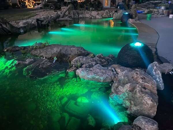 Swimming pond with green lights